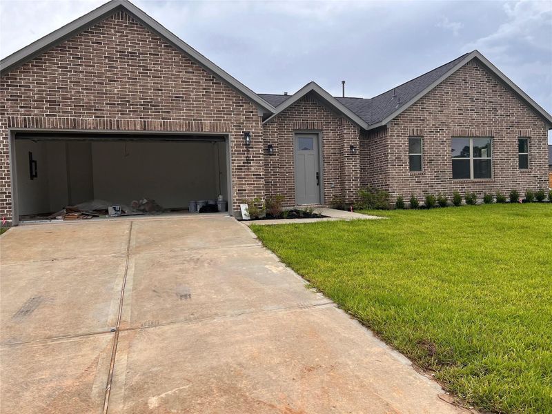 Front exterior of a new home in , Spring, TX, highlighting curb appeal (Image 2). Front exterior of a new home in , Spring, TX, highlighting curb appeal (Image 2).