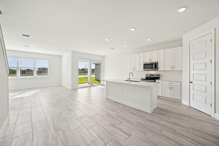 Furnished interior view inside a new home in Brystol at Wylder - Reserve Series, Port St. Lucie (Image 10).