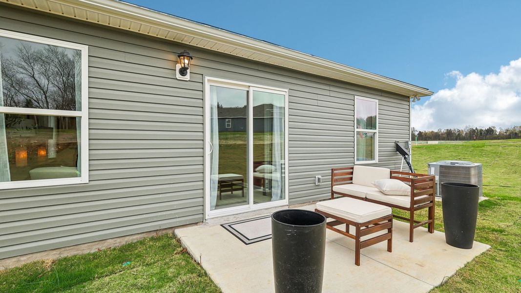 Exterior details and patio area of a home in Saddle Trace, Lewisburg (Image 3).
