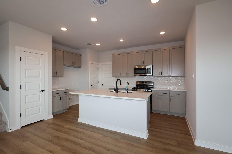 Furnished interior view inside a new home in Park Central, Georgetown (Image 6).