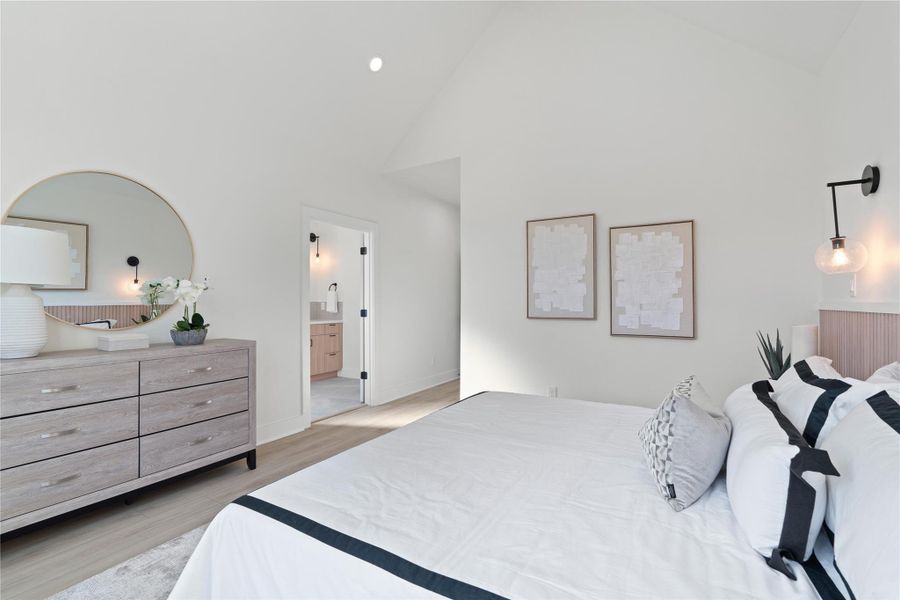 The primary bedroom seamlessly connects to an elegant ensuite, creating a private retreat within the home. Designed with both style and functionality in mind, the ensuite complements the bedroom’s warm, Scandinavian-inspired aesthetic. It’s a luxurious, convenient space where comfort and tranquility come together effortlessly. The primary bedroom seamlessly connects to an elegant ensuite, creating a private retreat within the home. Designed with both style and functionality in mind, the ensuite complements the bedroom’s warm, Scandinavian-inspired aesthetic. It’s a luxurious, convenient space where comfort and tranquility come together effortlessly.