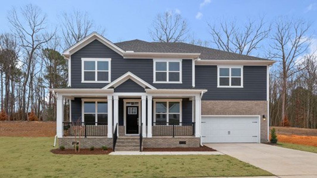 Representative exterior photo of a completed home built from the Tillery by D.R. Horton in The Estates Park, Apex, NC (Image 19).
