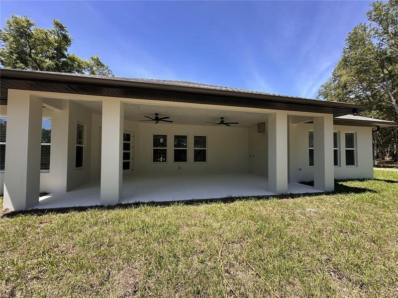 Exterior details and patio area of a home in , Groveland (Image 3).