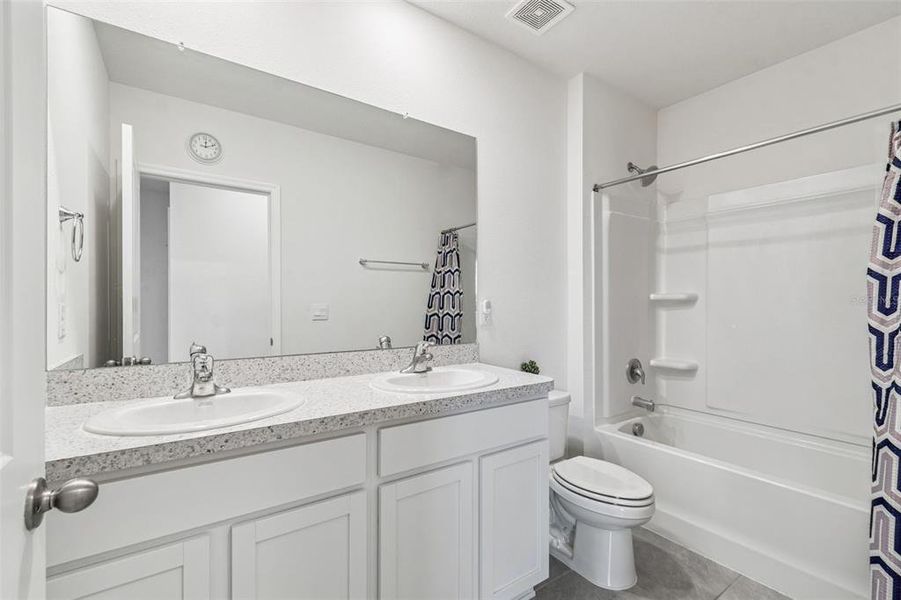 Furnished interior view inside a new home in Westgate at Avalon Park, Wesley Chapel (Image 49).