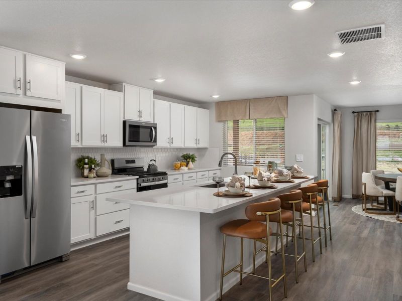 Furnished interior view inside a new home in Three Hills, Morrison (Image 3).