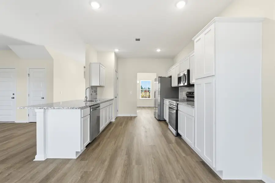 Representative furnished interior of a home built from the The Catherine by RTS Homes in Tibet Road at Sassafras, Allenhurst (Image 7).