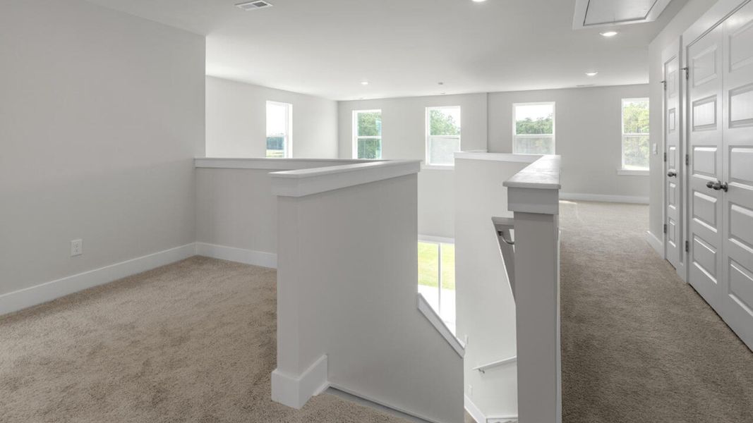 Spacious, unfurnished interior of a new home in Indigo Preserve Townhomes, Leland (Image 27).