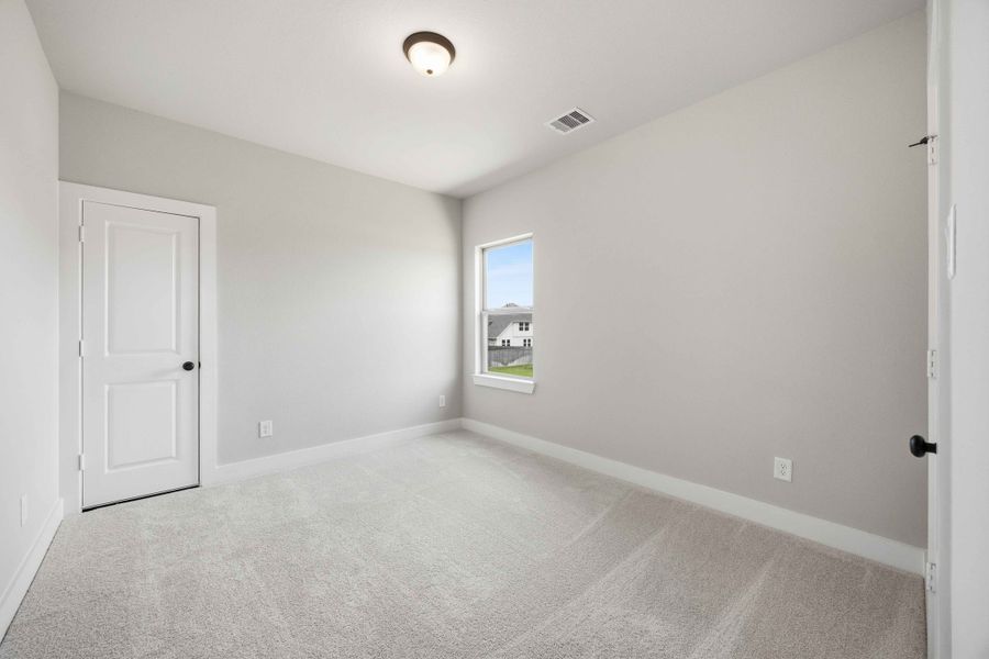 Spacious, unfurnished interior of a new home in Sunterra 50s, Katy (Image 39).