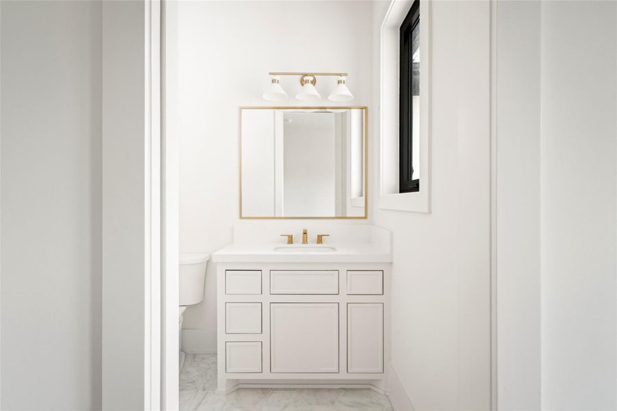 This ensuite bath is focused on simple finishes and elevated design.