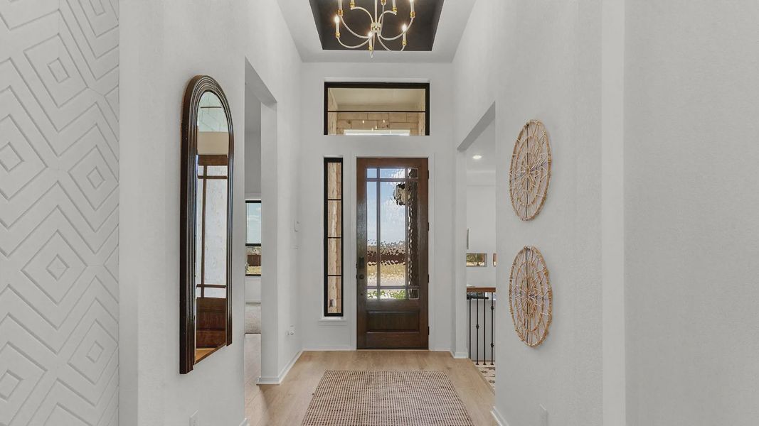 Representative furnished interior of a home built from the Mariah by Chesmar Homes in University Heights, Round Rock (Image 4).