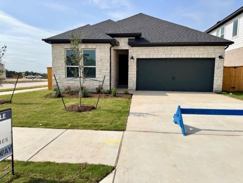 Front exterior of a new home in Heritage, Dripping Springs, TX, highlighting curb appeal (Image 21).