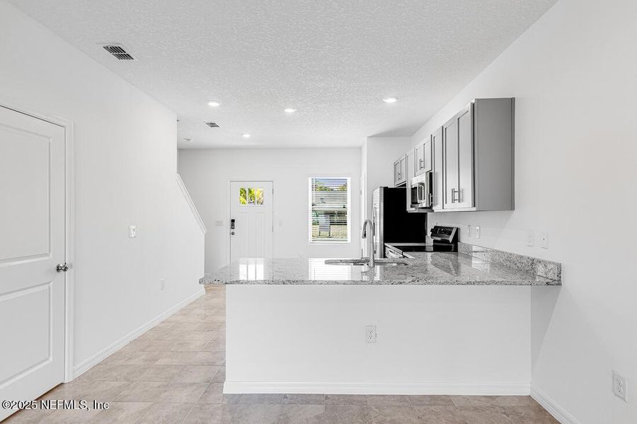 Furnished interior view inside a new home in Sabal Terrace, Jacksonville (Image 6). Furnished interior view inside a new home in Sabal Terrace, Jacksonville (Image 6).