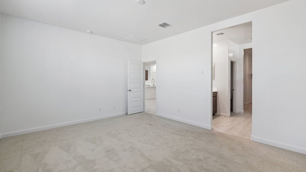 Spacious, unfurnished interior of a new home in Desert Moon Estates, Buckeye (Image 15).