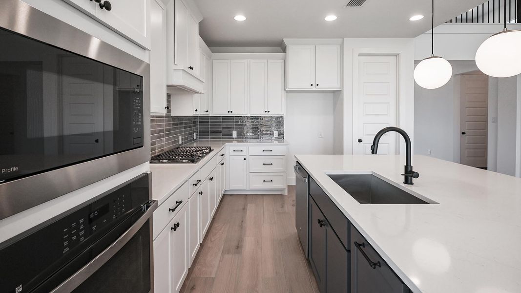 Furnished interior view inside a new home in Crosswinds, Kyle (Image 12).