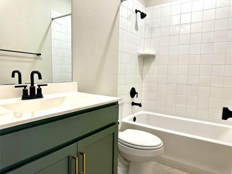 Furnished interior view inside a new home in The Colony 50s, Bastrop (Image 8).