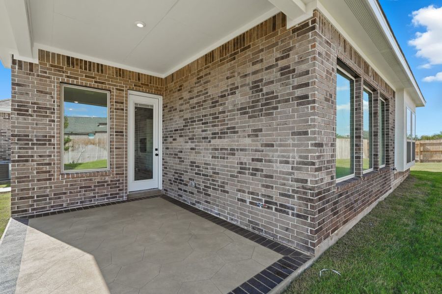 Exterior details and patio area of a home in Alsatian Oaks, Castroville (Image 25).
