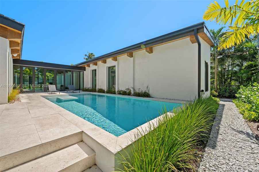 Exterior details and patio area of a home in , Coral Gables (Image 23).