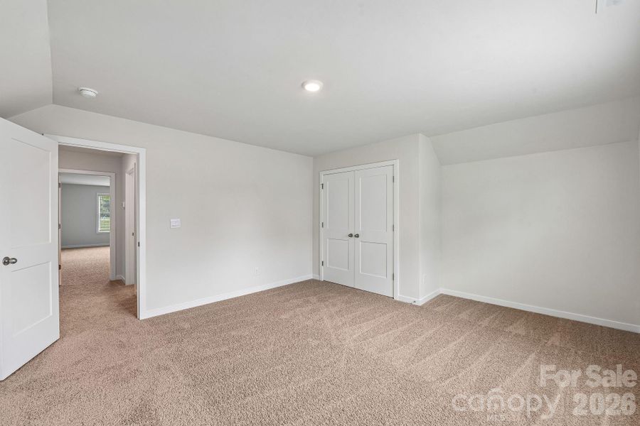 Spacious, unfurnished interior of a new home in Sanctuary at Southgate, Indian Trail (Image 21).