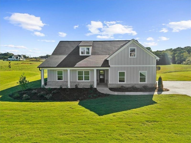 Front exterior of a new home in , Cumming, GA, highlighting curb appeal (Image 23).
