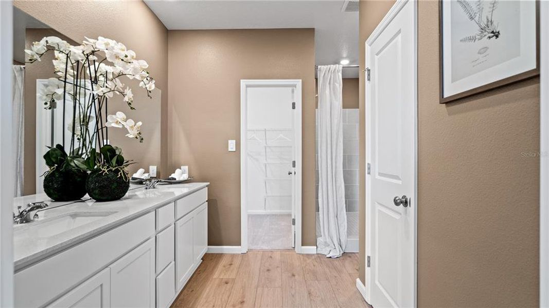 Furnished interior view inside a new home in Wellness Ridge, Clermont (Image 25). Furnished interior view inside a new home in Wellness Ridge, Clermont (Image 25).