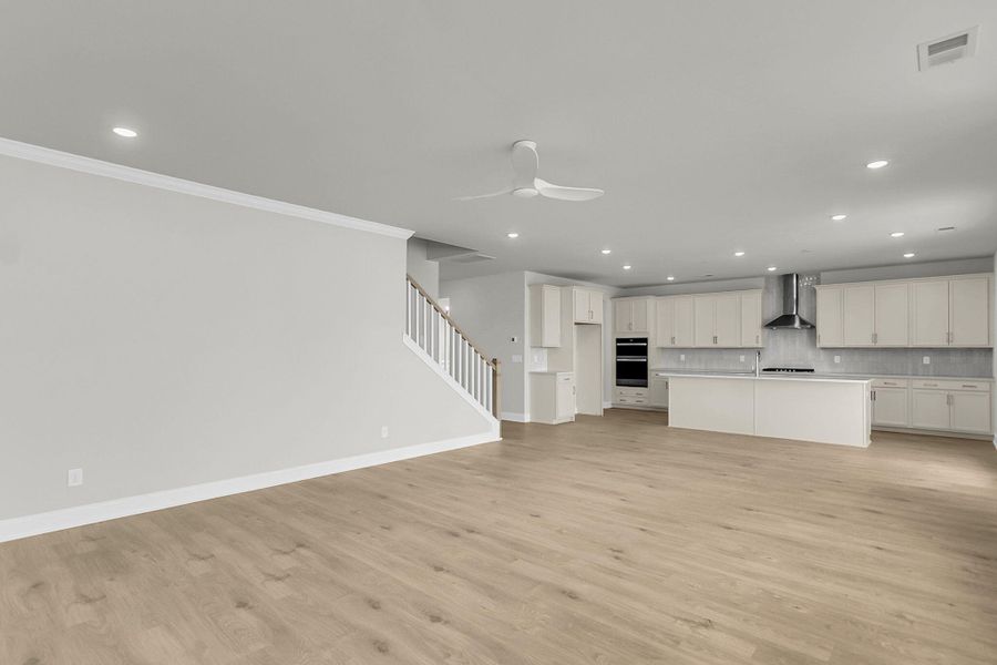 Spacious, unfurnished interior of a new home in Tidewater at Lakes of Cane Bay, Summerville (Image 41).