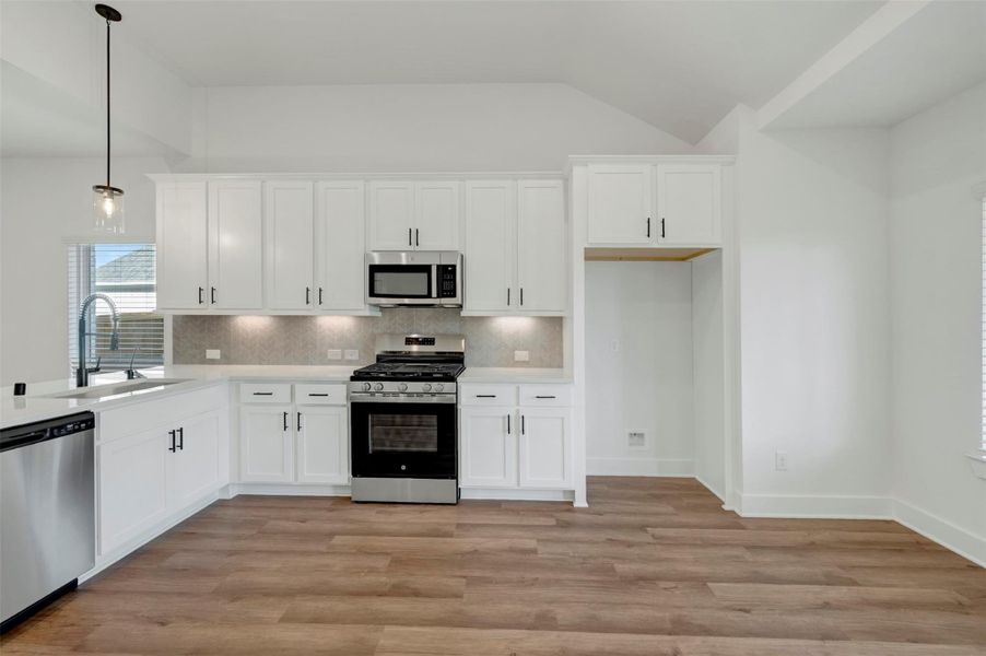 Furnished interior view inside a new home in Marvida, Cypress (Image 13).