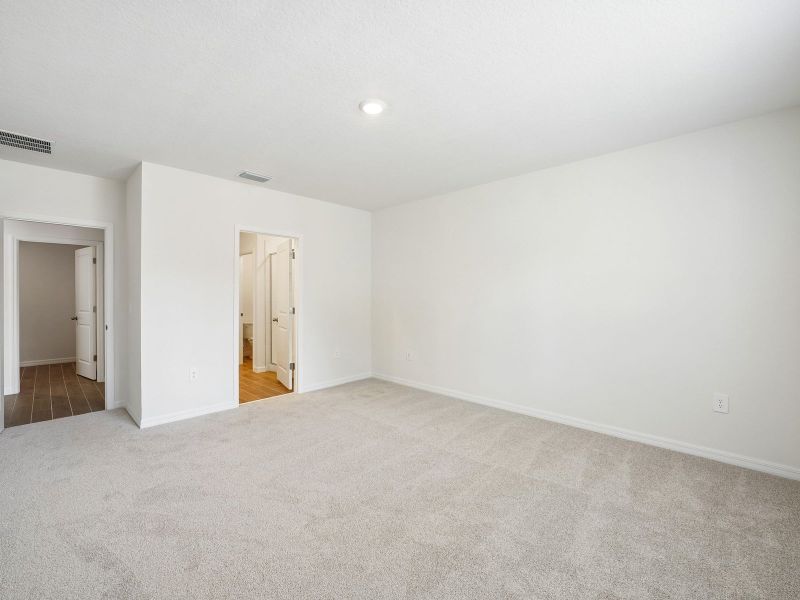 Spacious, unfurnished interior of a new home in The Grove at Stuart Crossing - Classic Series, Bartow (Image 18). Spacious, unfurnished interior of a new home in The Grove at Stuart Crossing - Classic Series, Bartow (Image 18).
