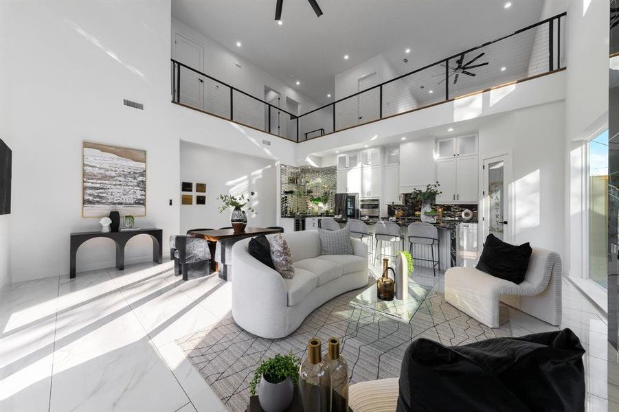 Open living space with natural light pouring in. Open living space with natural light pouring in.