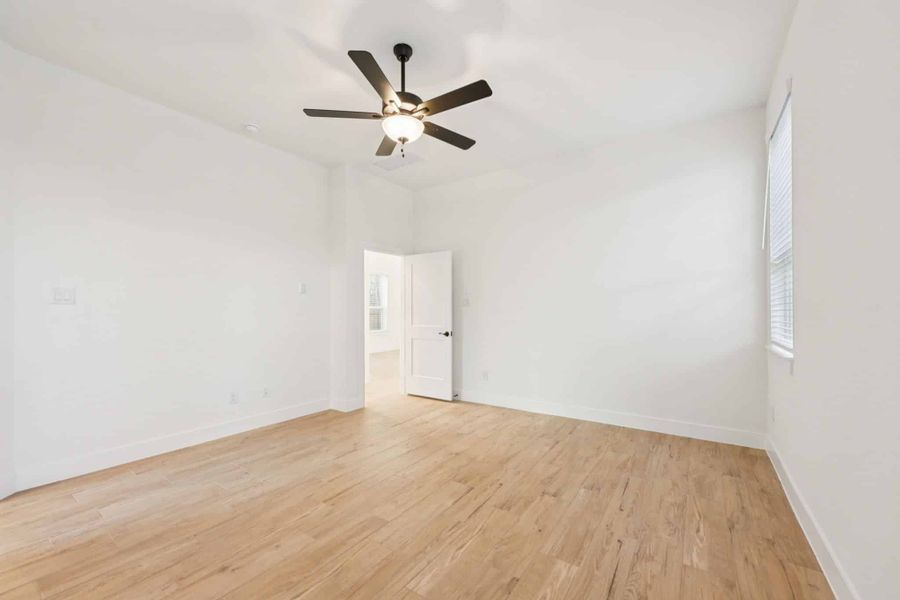 Spacious, unfurnished interior of a new home in The Woodlands Hills, Willis (Image 42).