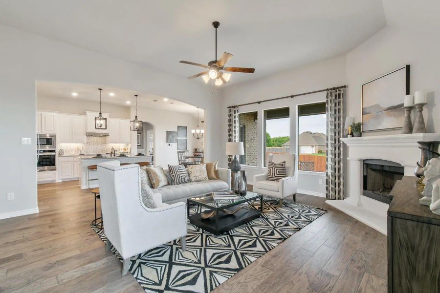 Family Room | Concept 2434 at Coyote Crossing in Godley, TX by Landsea Homes