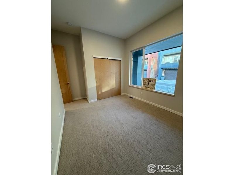 Spacious, unfurnished interior of a new home in West Grange, Longmont (Image 15).