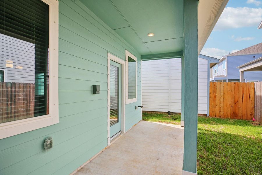 Exterior details and patio area of a home in Kemah Crossing - City Series, Kemah (Image 17). Exterior details and patio area of a home in Kemah Crossing - City Series, Kemah (Image 17).