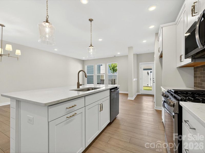 Furnished interior view inside a new home in North Creek Village - Townhomes, Huntersville (Image 6).