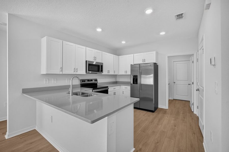 Furnished interior view inside a new home in Palm Wind, Hudson (Image 3).