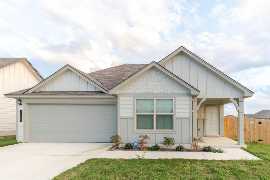 Front exterior of a new home in Willow Glenn, Temple, TX, highlighting curb appeal (Image 24).