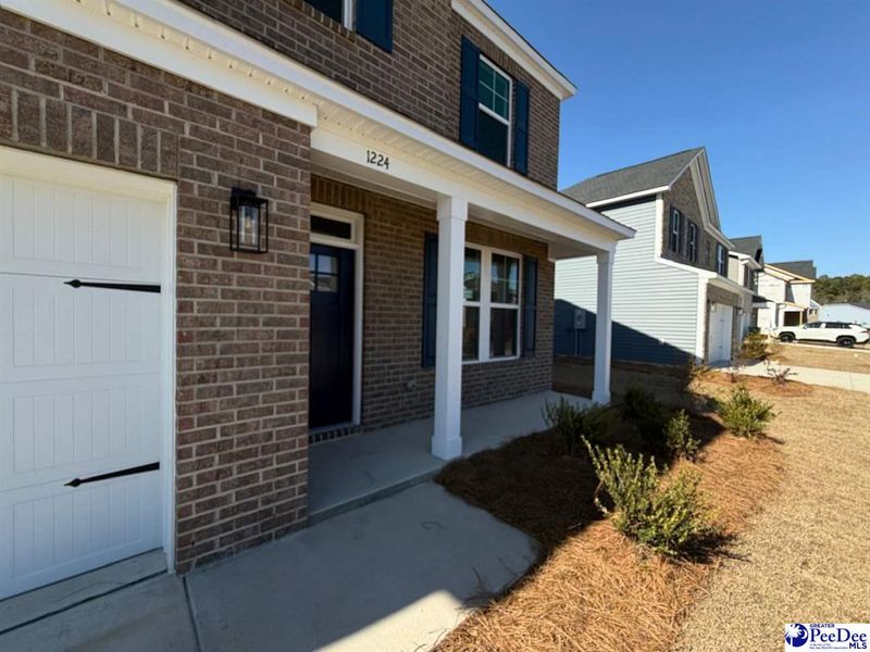 Exterior details and patio area of a home in The Grove, Florence (Image 3).