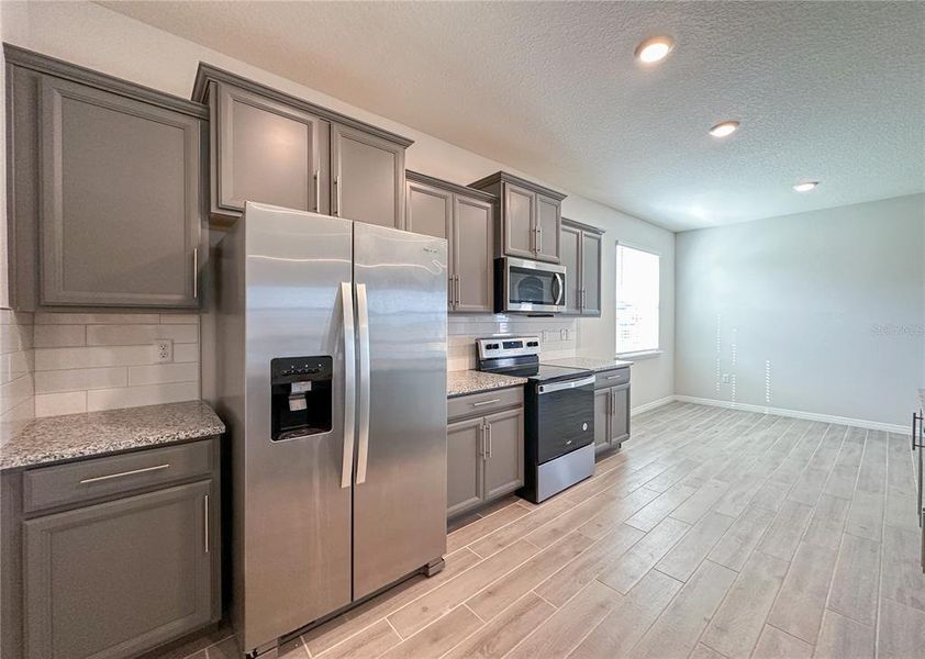 Furnished interior view inside a new home in , Winter Garden (Image 3).