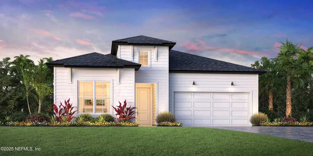 Front exterior of a new home in , St. Johns, FL, highlighting curb appeal (Image 1). Front exterior of a new home in , St. Johns, FL, highlighting curb appeal (Image 1).