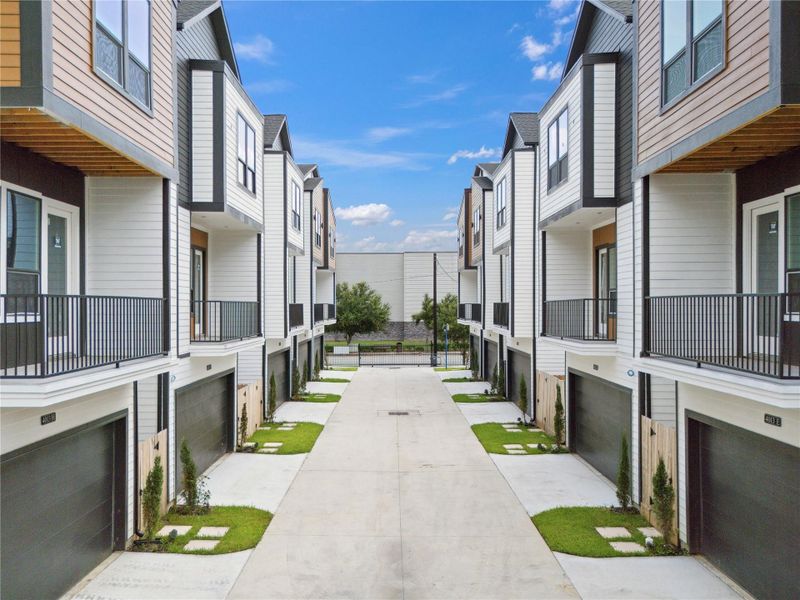 A cohesive collection of modern homes, this community balances density and design across freestanding footprints.