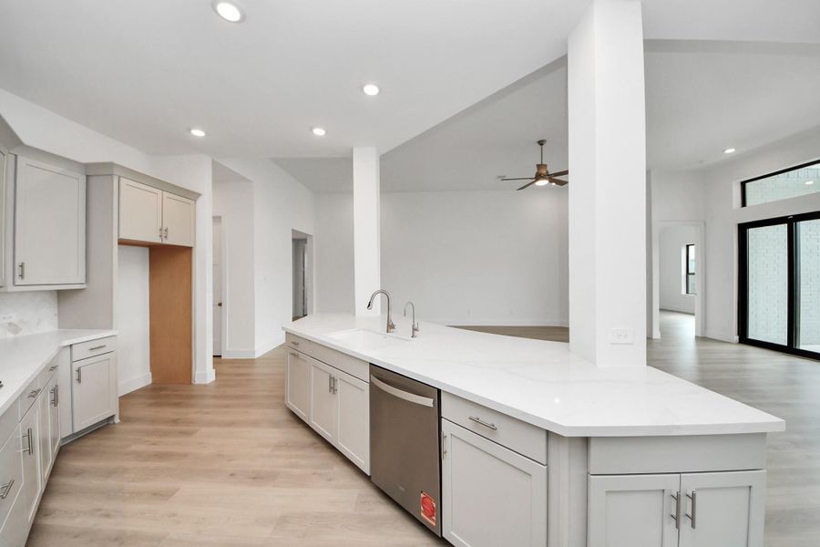 Furnished interior view inside a new home in ARTAVIA: Hilltop Collection, Conroe (Image 8).