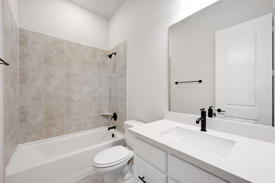 Furnished interior view inside a new home in The Ranch at Uptown Celina, Celina (Image 6).