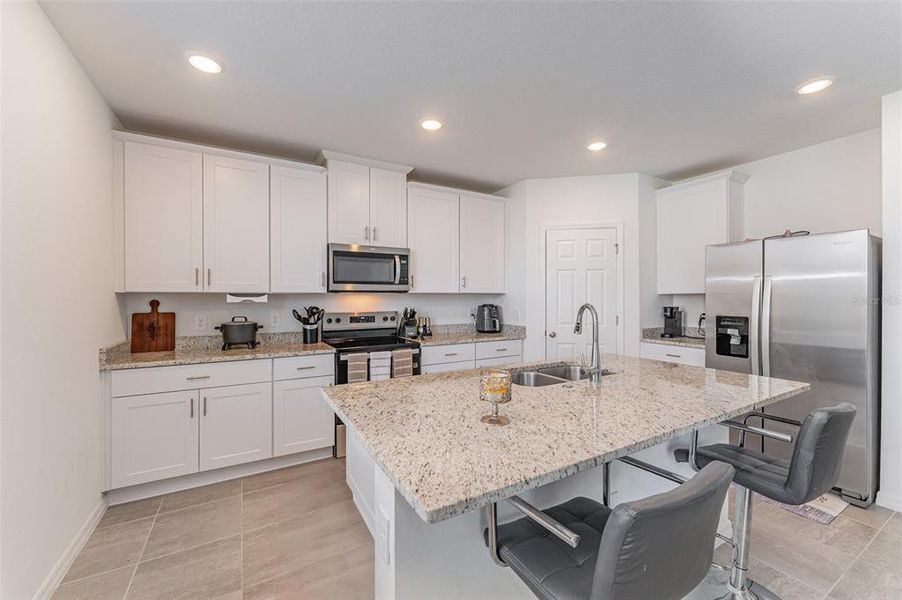 Furnished interior view inside a new home in Villamar - Signature Series, Winter Haven (Image 10).