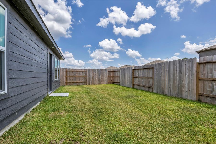 Exterior details and patio area of a home in , New Caney (Image 4). Exterior details and patio area of a home in , New Caney (Image 4).