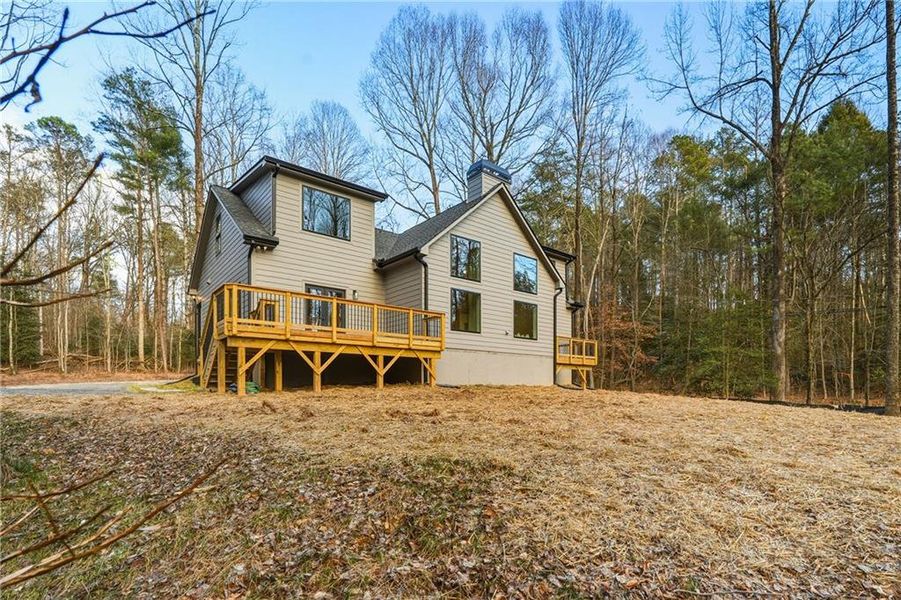 Exterior details and patio area of a home in , Ellijay (Image 31).