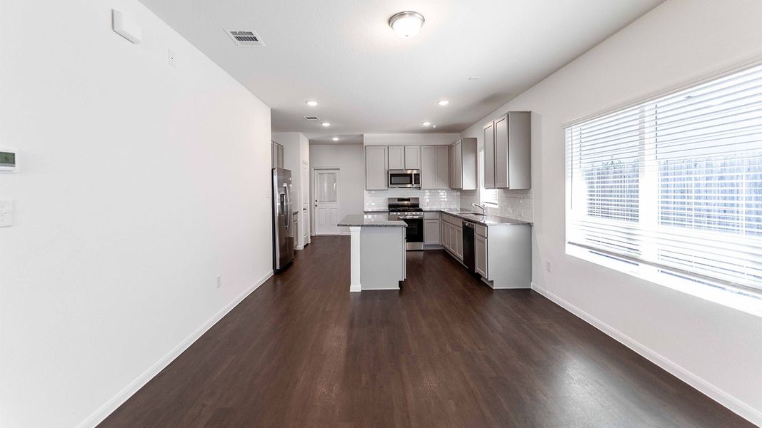 Furnished interior view inside a new home in Brooklands, Hutto (Image 4).