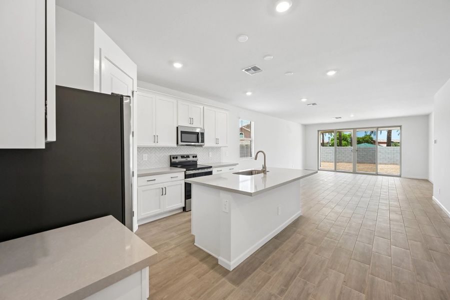 Kitchen, dining and great room Kitchen, dining and great room