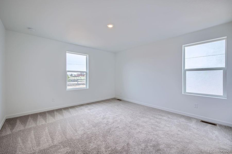 Spacious, unfurnished interior of a new home in Percheron: The Camden Collection, Colorado Springs (Image 8).