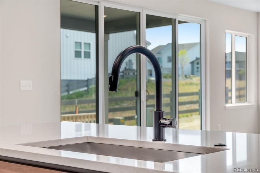 Furnished interior view inside a new home in Wild Oak at The Canyons, Castle Pines (Image 9). Furnished interior view inside a new home in Wild Oak at The Canyons, Castle Pines (Image 9).