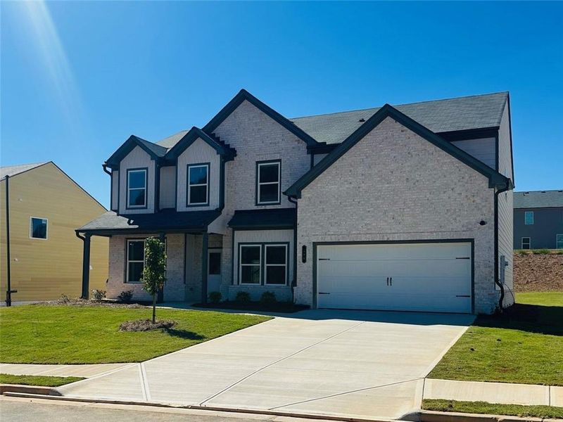 Front exterior of a new home in Beckett Ranch, Auburn, GA, highlighting curb appeal (Image 22).