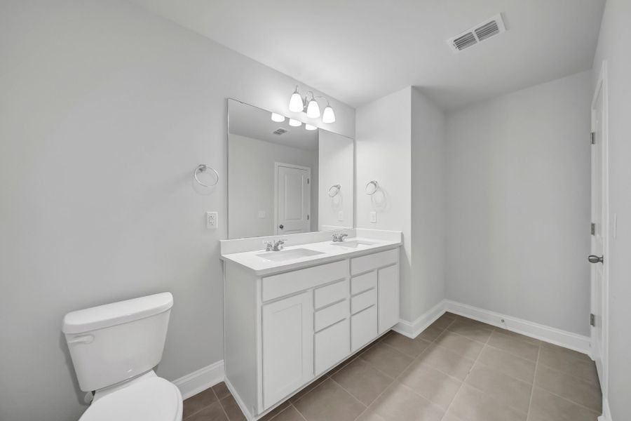 Furnished interior view inside a new home in Monroe Preserve, Chapin (Image 7).